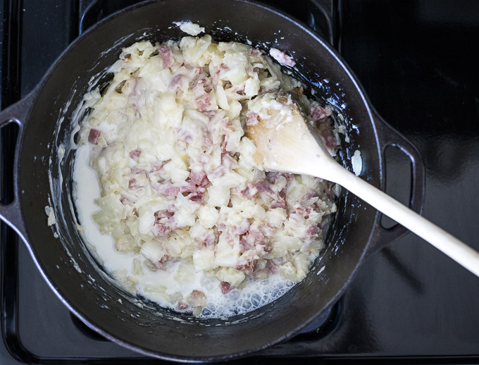 ham onions and milk in a dutch oven