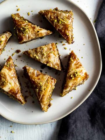 triangles of baklava on a plate