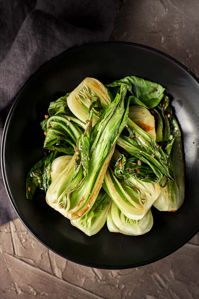 pieces of bok choy on a plate