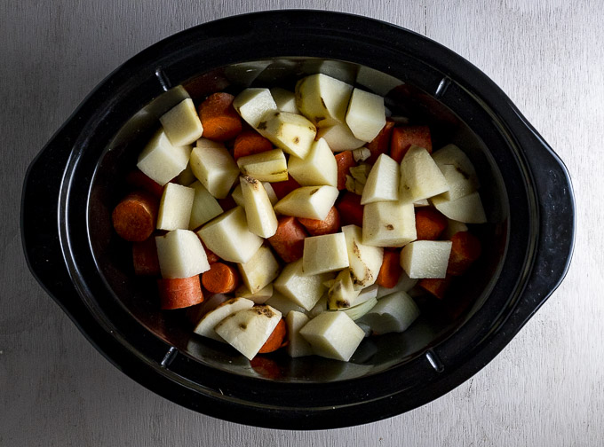 potatoes and carrots in a slow cooker