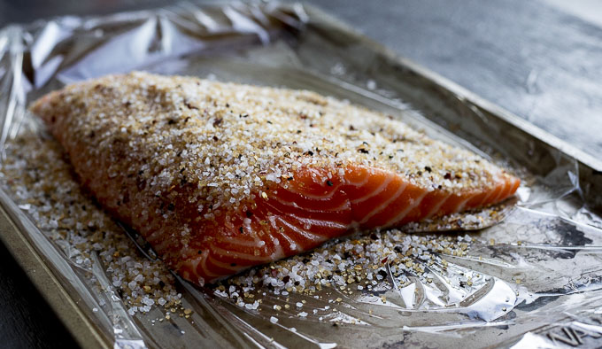 raw salmon coated with salt and spice mixture