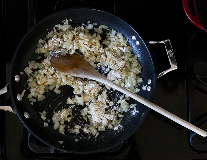 onions and flour cooking in a skillet