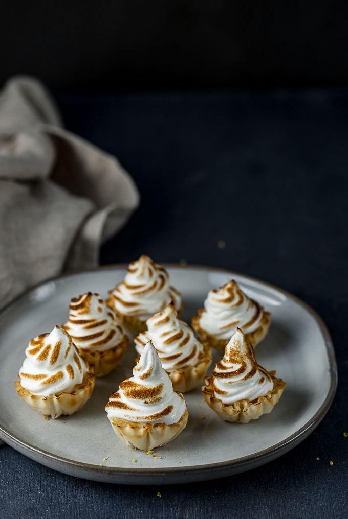 plate of meringue topped tarts