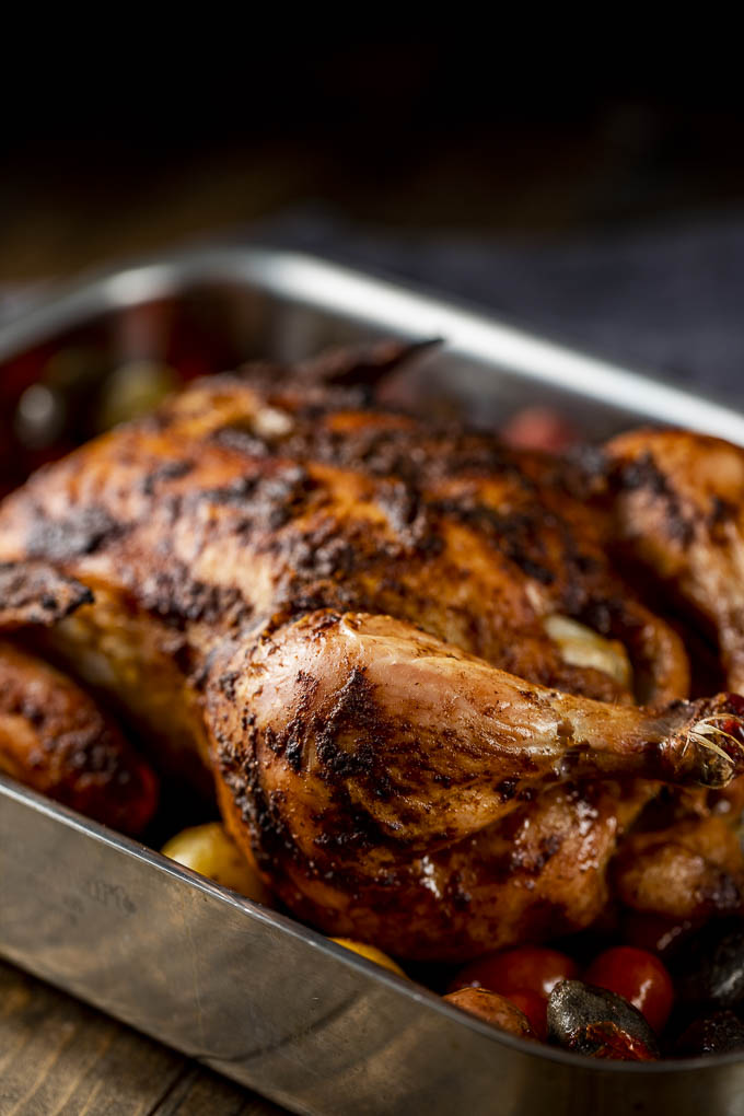 roasted moroccan chicken in a roasting pan
