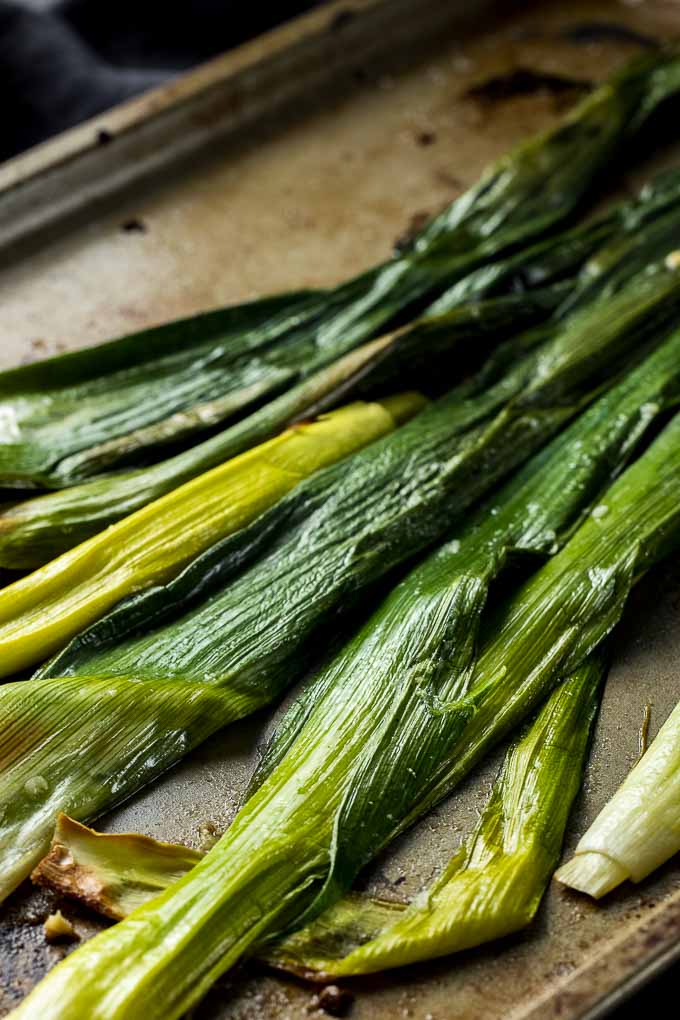 leeks roasted in olive oil on a tray