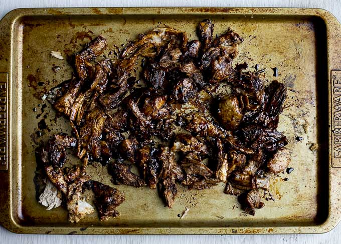 caramelized pork pieces on a baking sheet