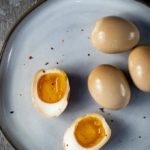 soft boiled marinated eggs on a plate