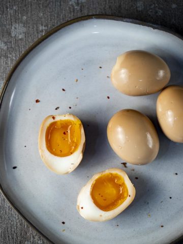 soft boiled marinated eggs on a plate