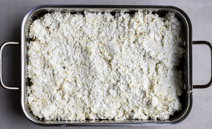 cottage cheese mixture in a lasagna pan
