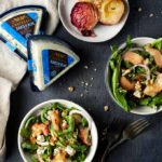 2 bowls of salad with grilled peaches and blue cheese