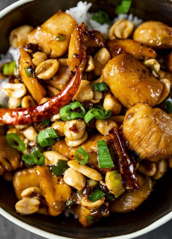 kung pao chicken with chilies and peanuts with green onions