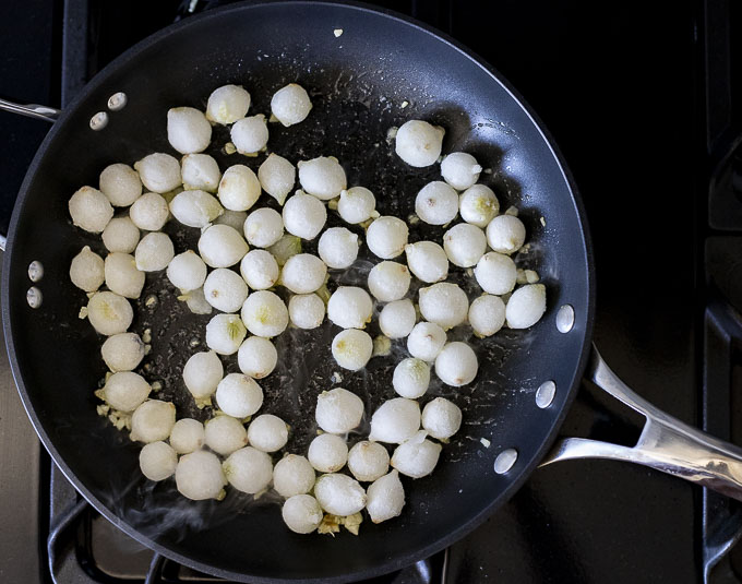 pearl onions in a skillet