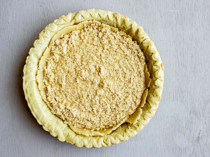 beige batter in a pie crust (unbaked)