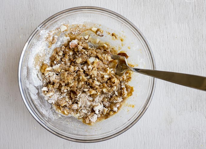 brown batter with crushed almonds in a bowl