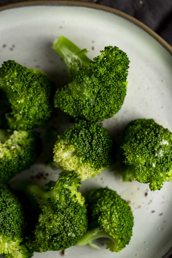 steamed broccoli on a plate