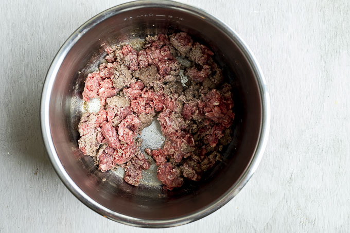 raw ground beef in a pot