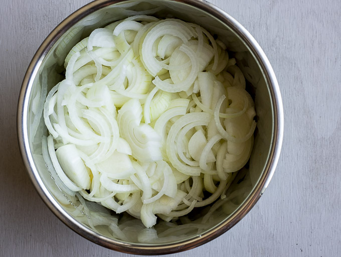 sliced onions in a pot
