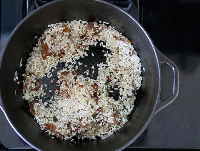 rice and bacon in a pot