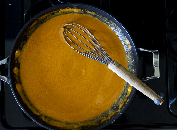 orange sauce in a skillet
