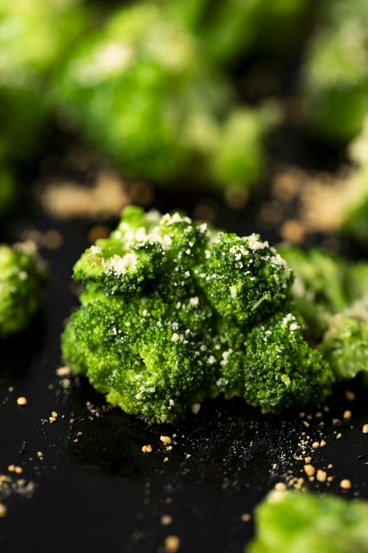 broccoli floret sprinkled with parmesan cheese