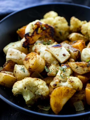roasted cauliflower, pumpkin and parsnips in a bowl