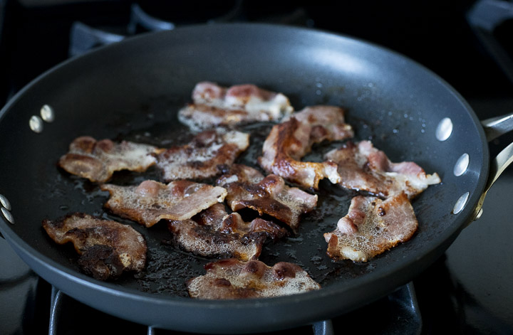 bacon frying in a skillet