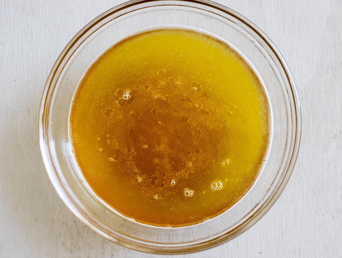 melted butter (ghee) in a glass bowl