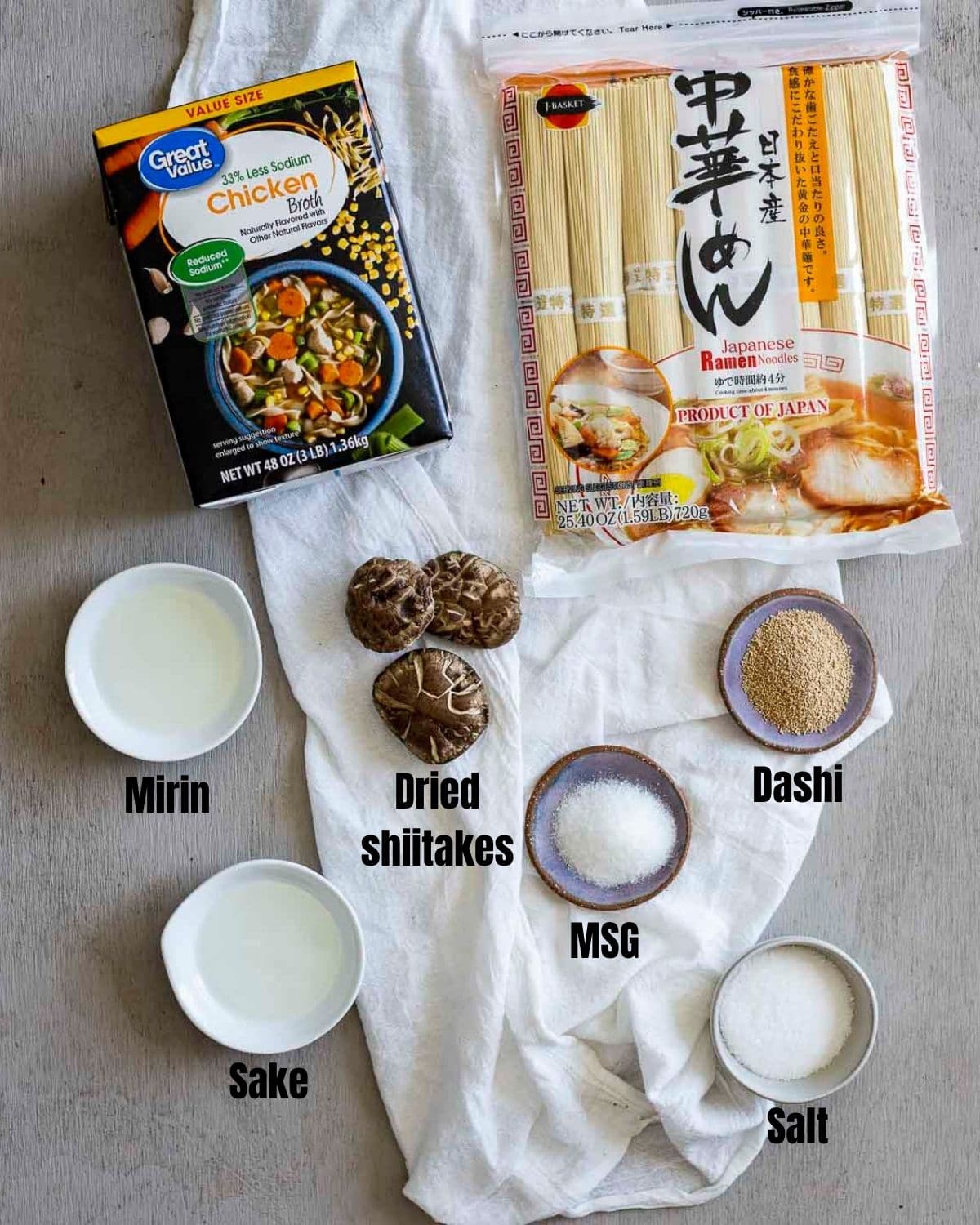 Ingredients to make shio ramen arranged individually and labelled.