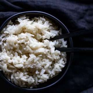 a bowl of cooked white short grain rice