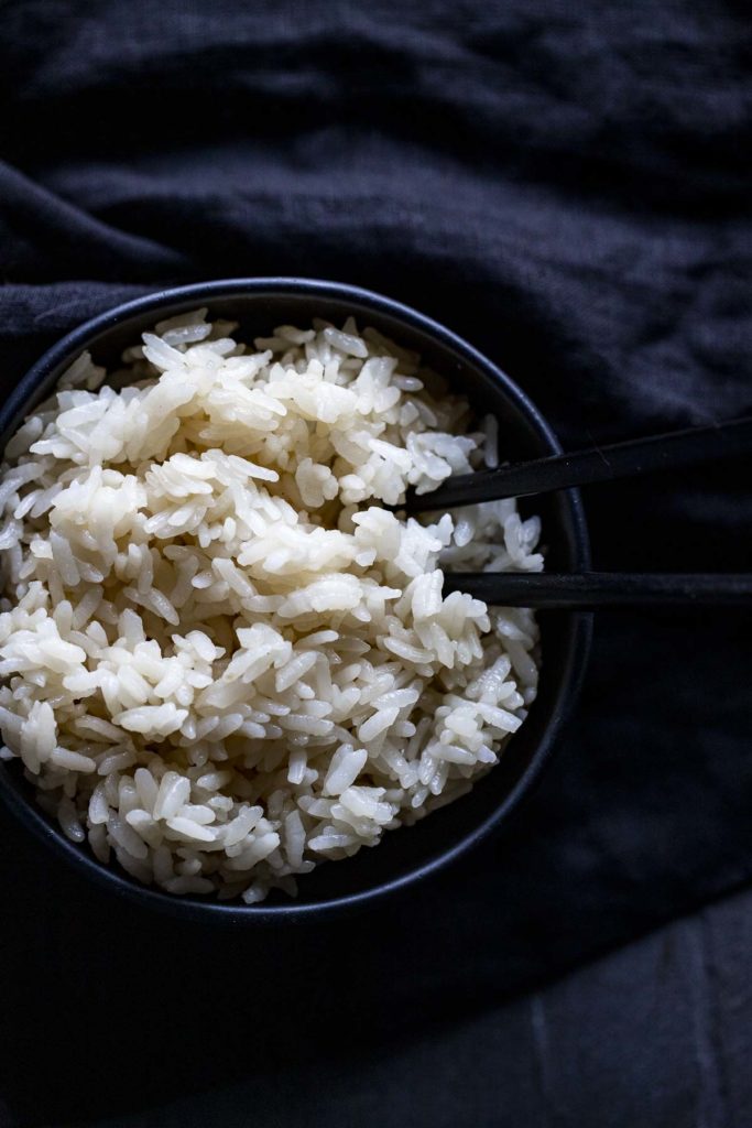 a bowl of cooked white short grain rice