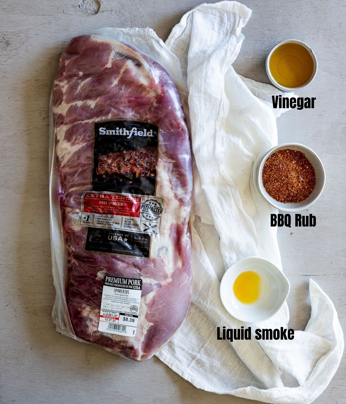 Ingredients to make sous vide ribs arranged individually and labelled.