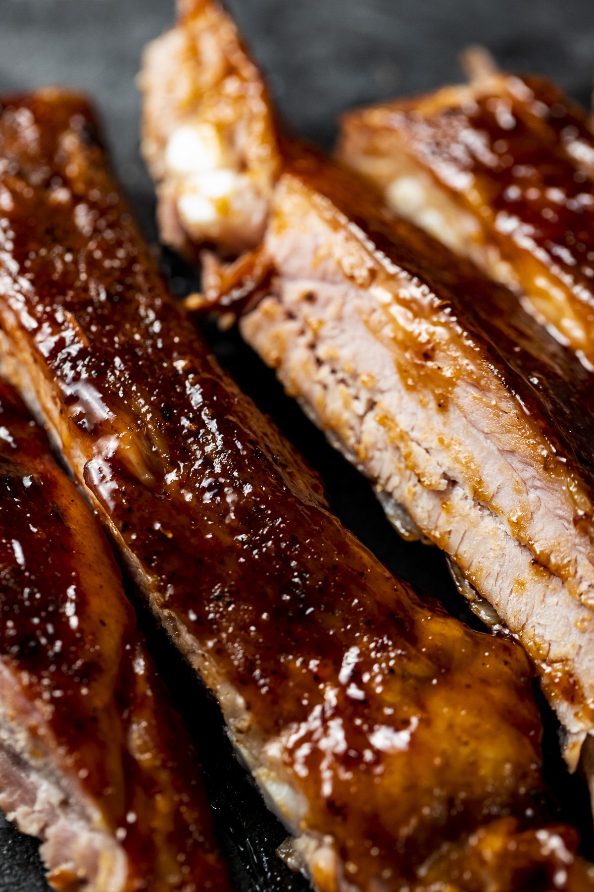 Close up view of sous vide ribs cut into pieces.