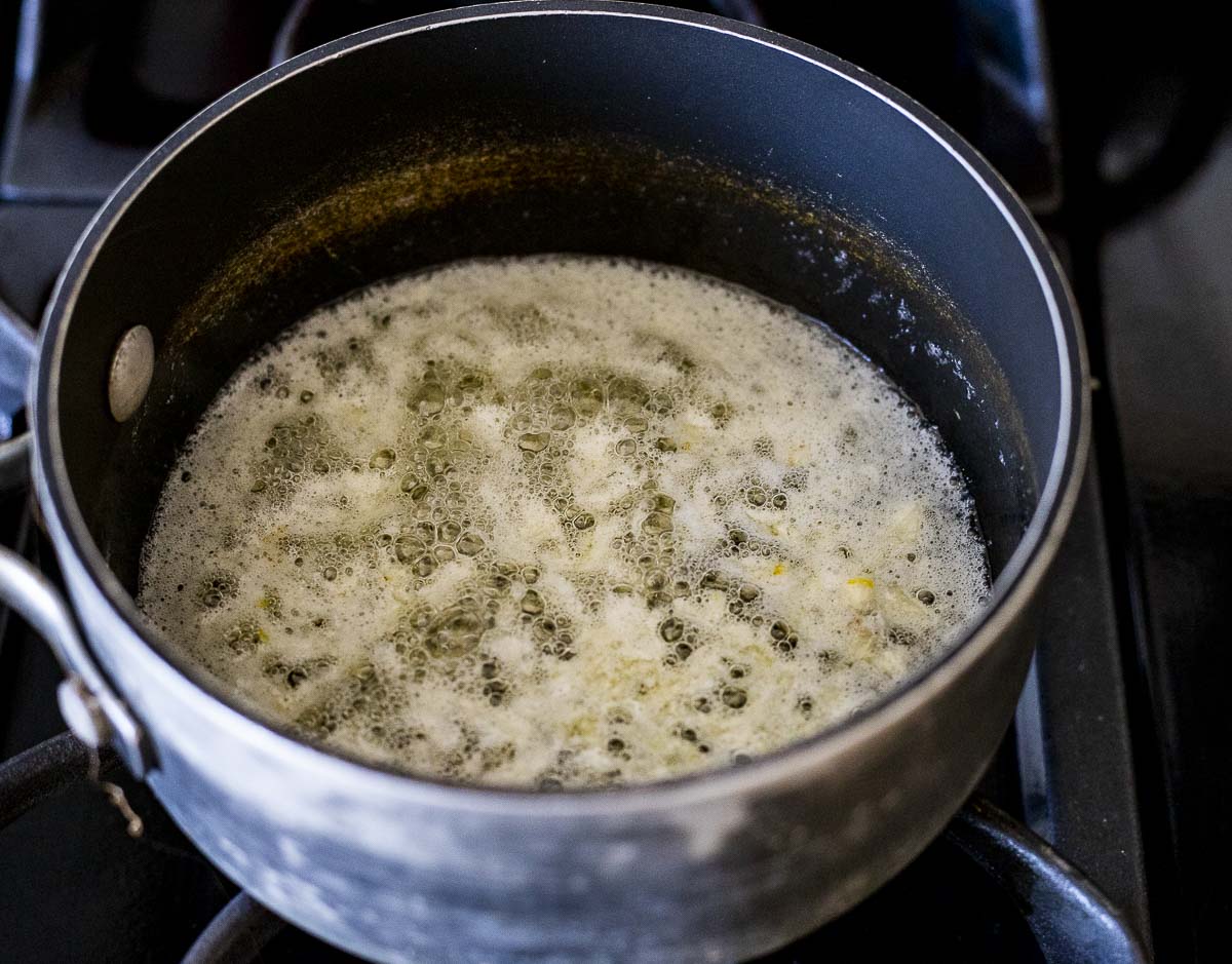 butter and garlic simmering in a saucepan