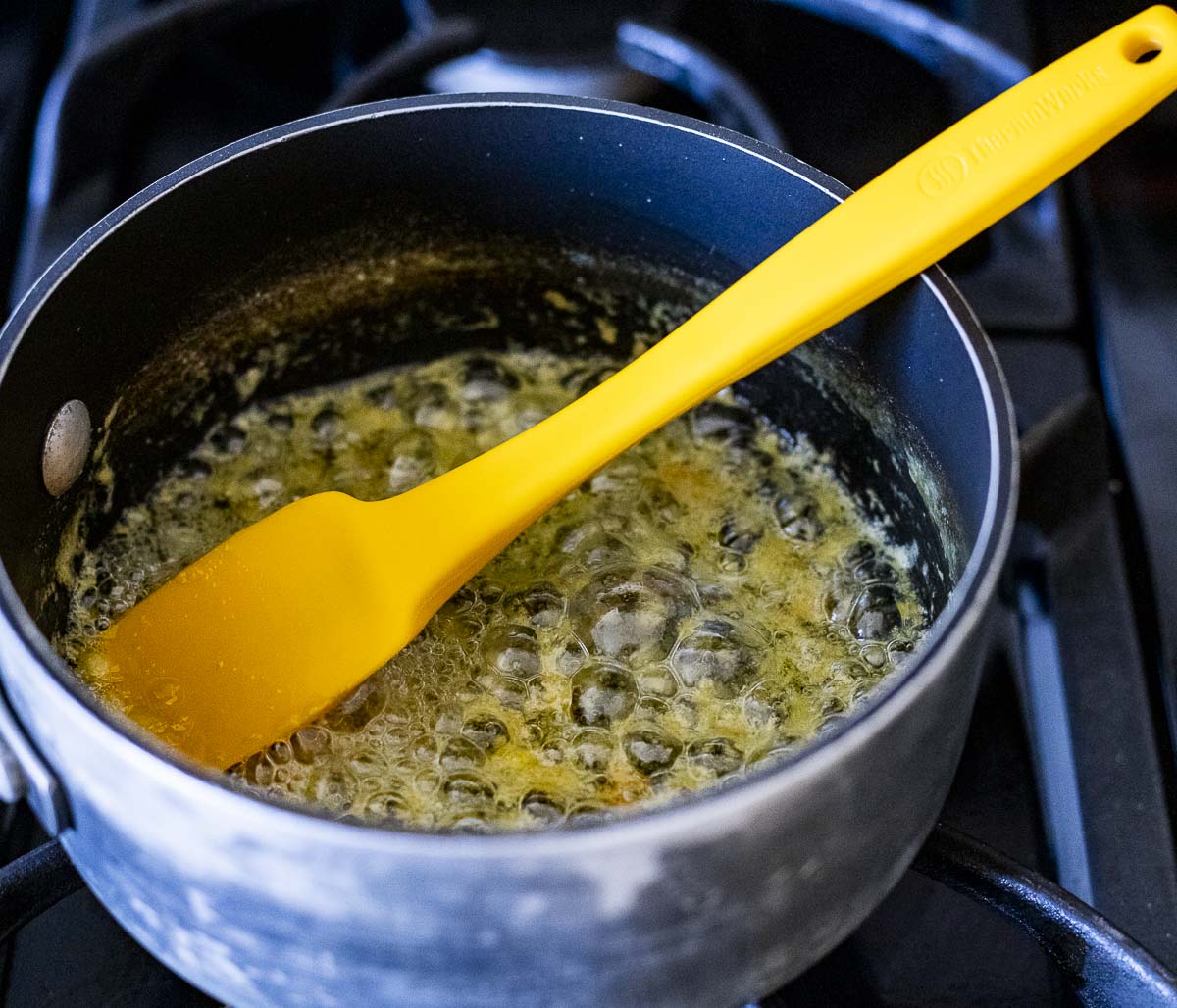 butter, garlic and lemon zest in a saucepan
