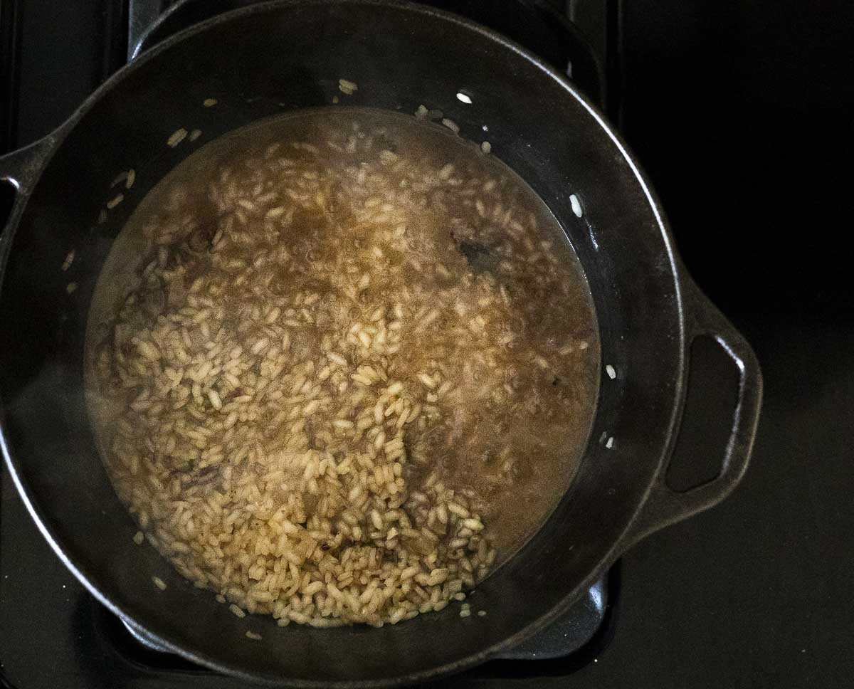 short grain rice, liquid and seasonings in a pot