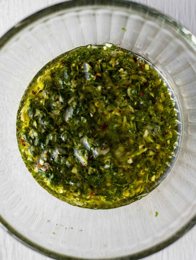 green sauce in a glass bowl
