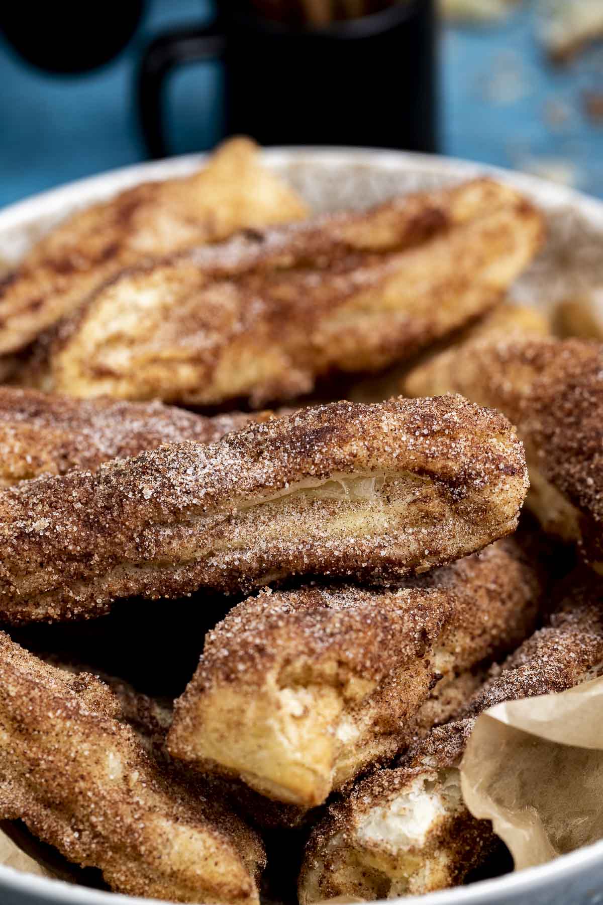 Close up of a plate of churros.