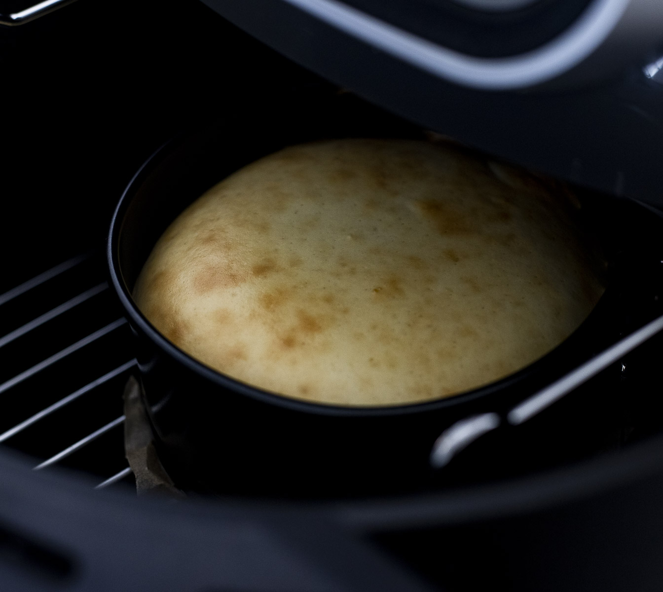 Cheesecake inside of an air fryer.