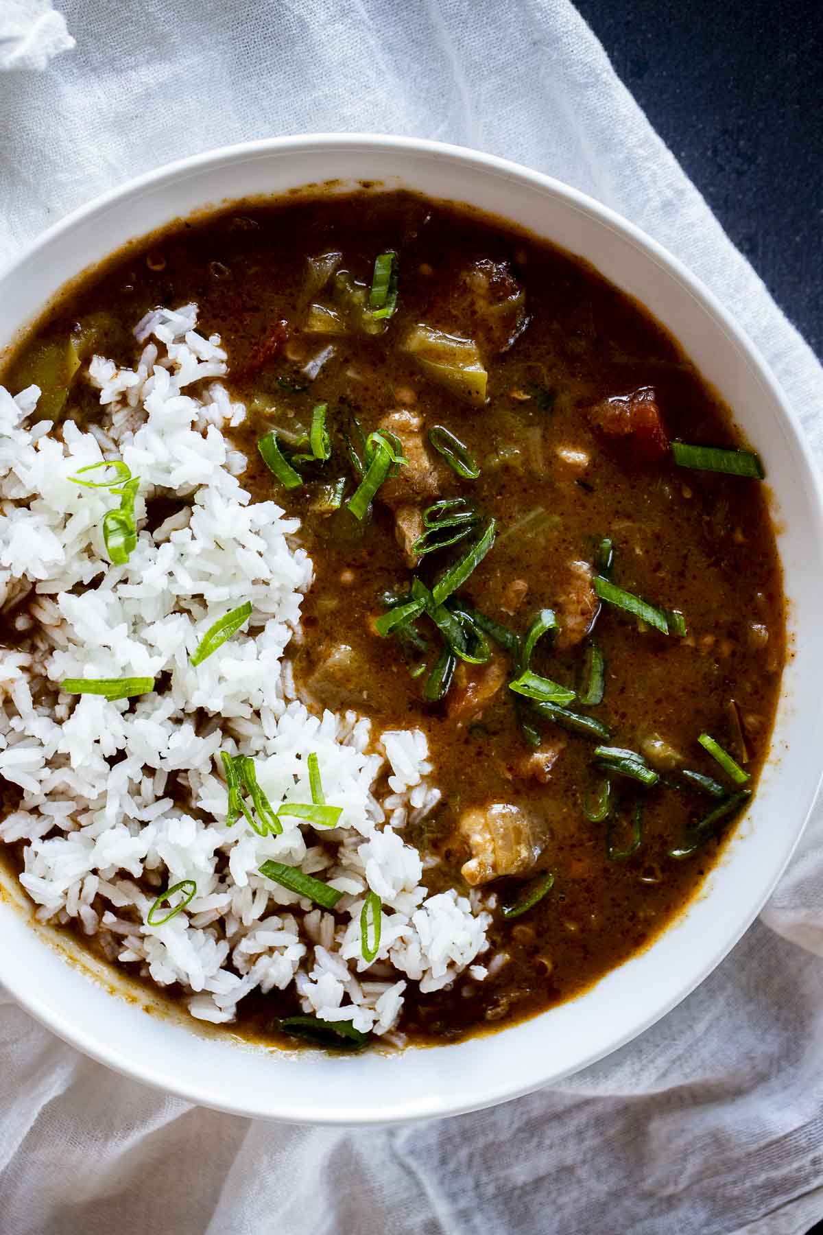Instant Pot gumbo in a white bowl.