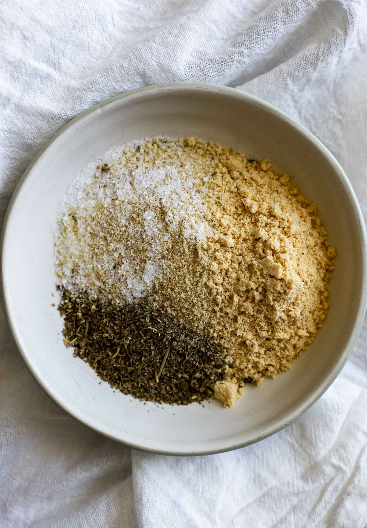 Ingredients for breadcrumb mixture in a small bowl.