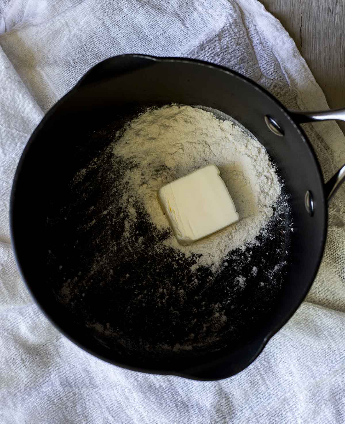 Butter and flour in a saucepan to make gravy.