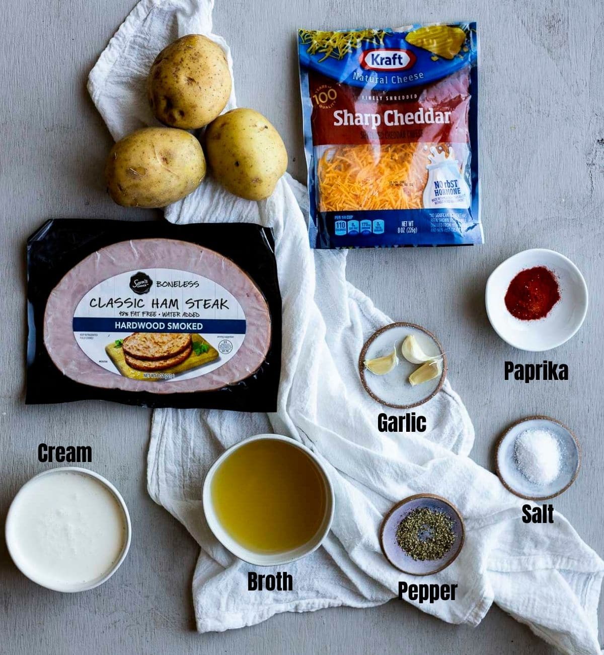 Ingredients to make Instant Pot scalloped potatoes arranged individually and labelled.