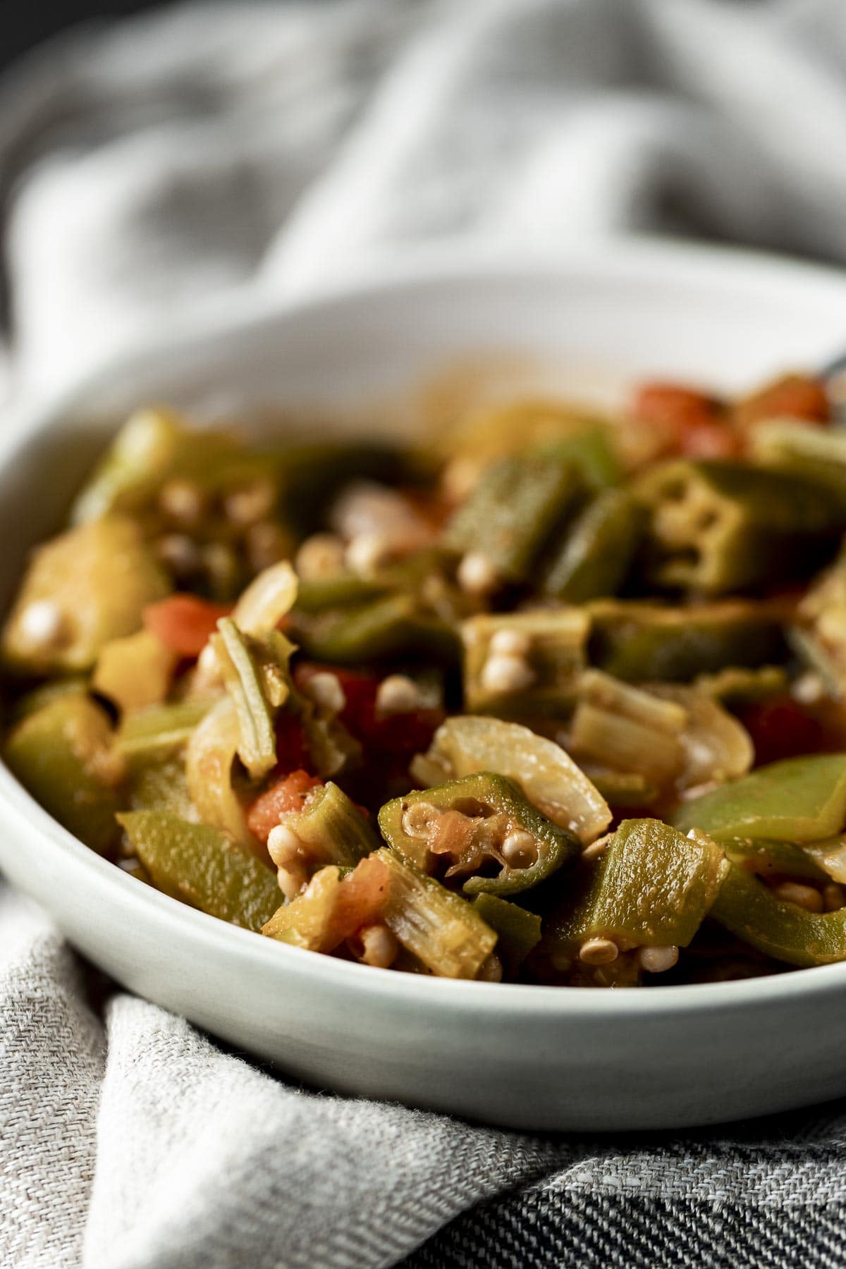 Close up of smothered okra in a bowl.