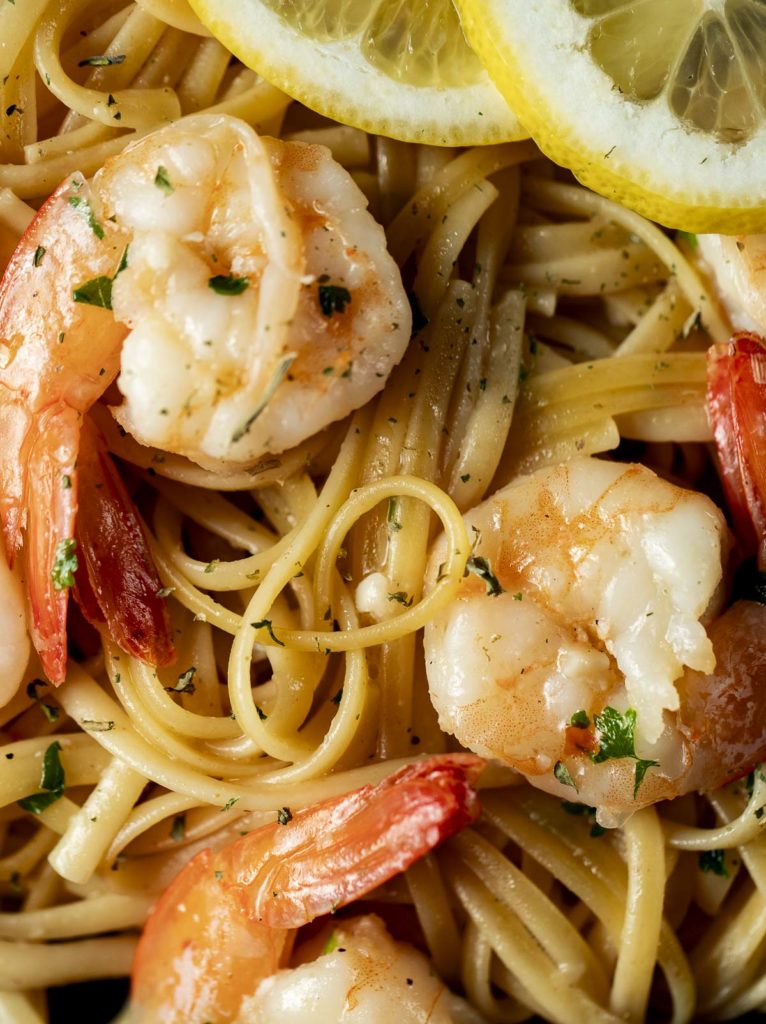 Close up of shrimp and linguine.