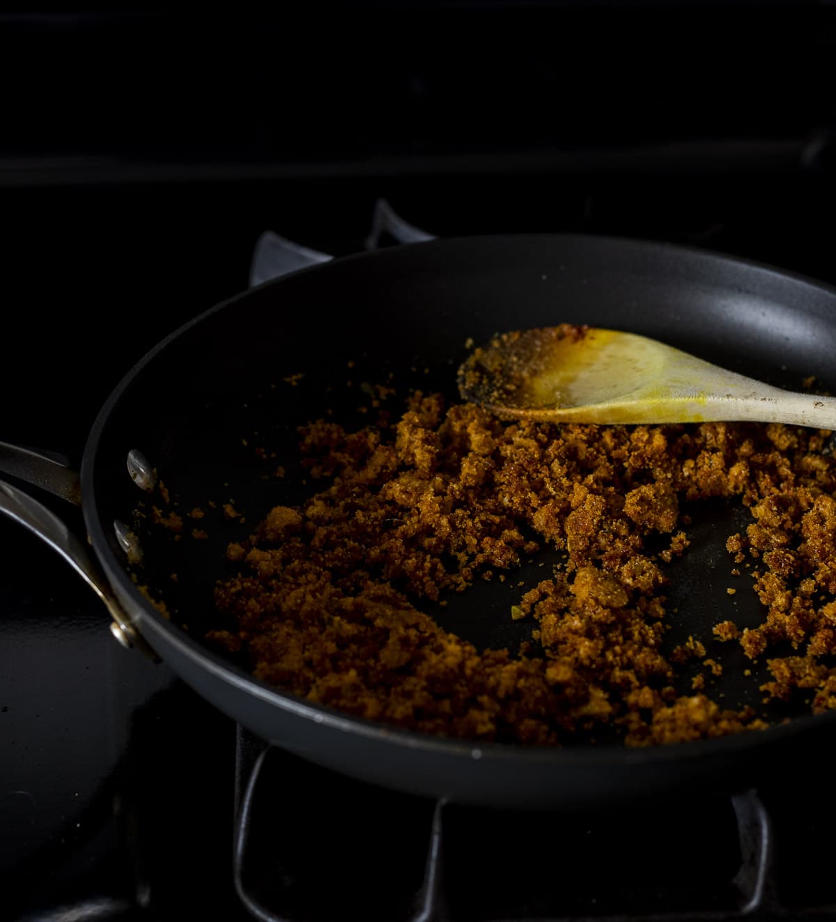 Cooked chorizo mixture in a skillet.