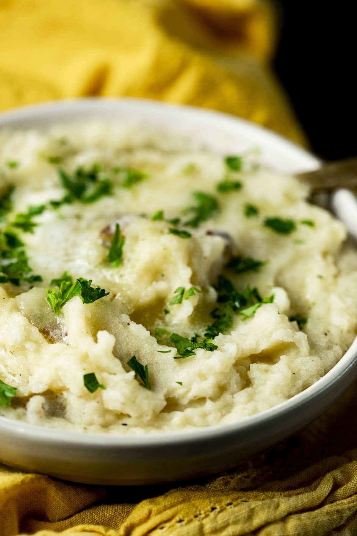 Side view of sous vide mashed potatoes in a bowl.