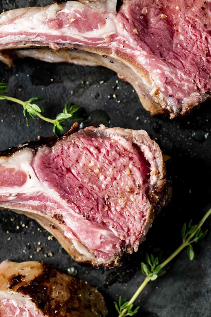 Close up view of sous vide rack of lamb cut into slices.