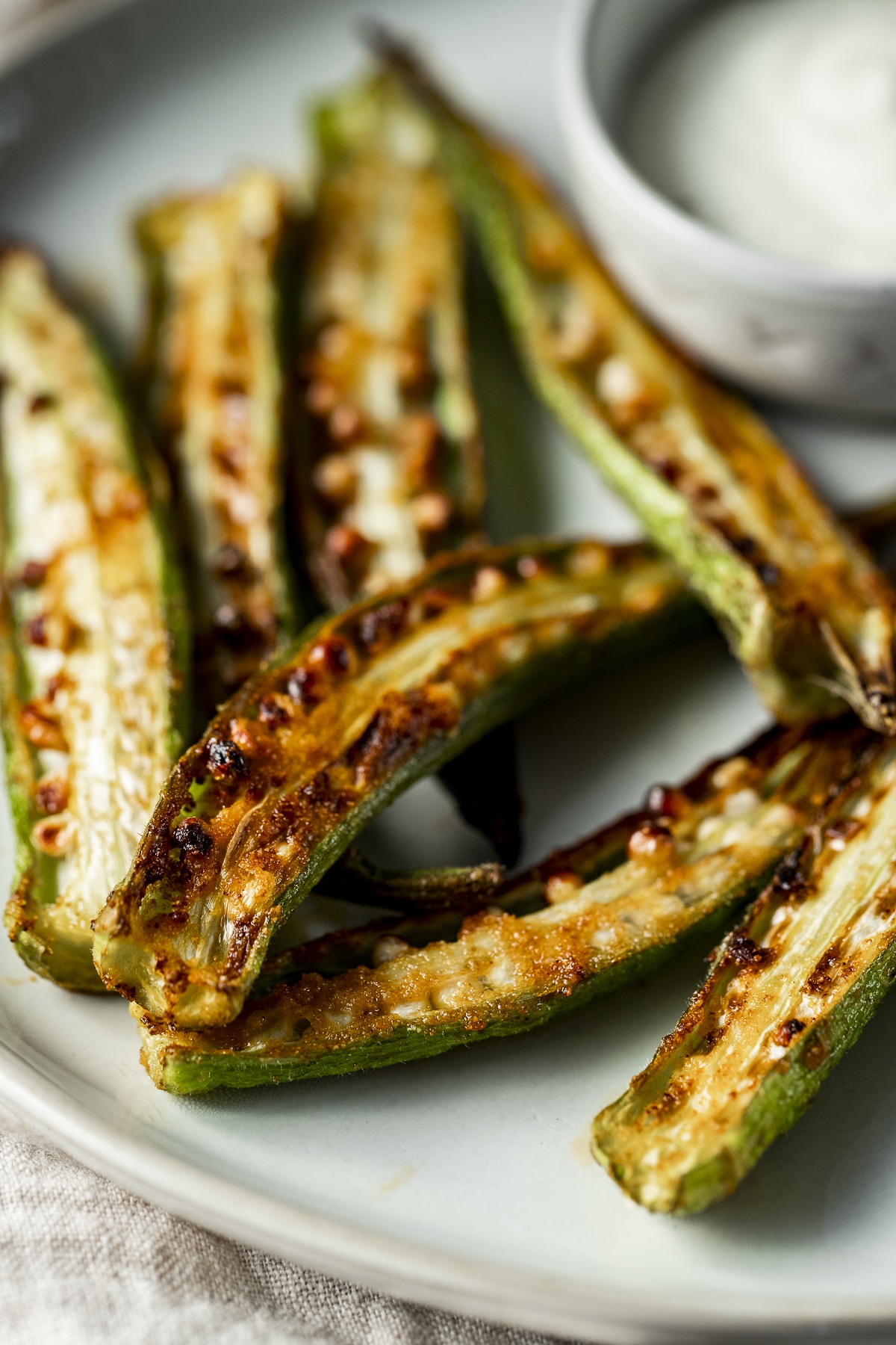 Close up view of air fried okra fries.