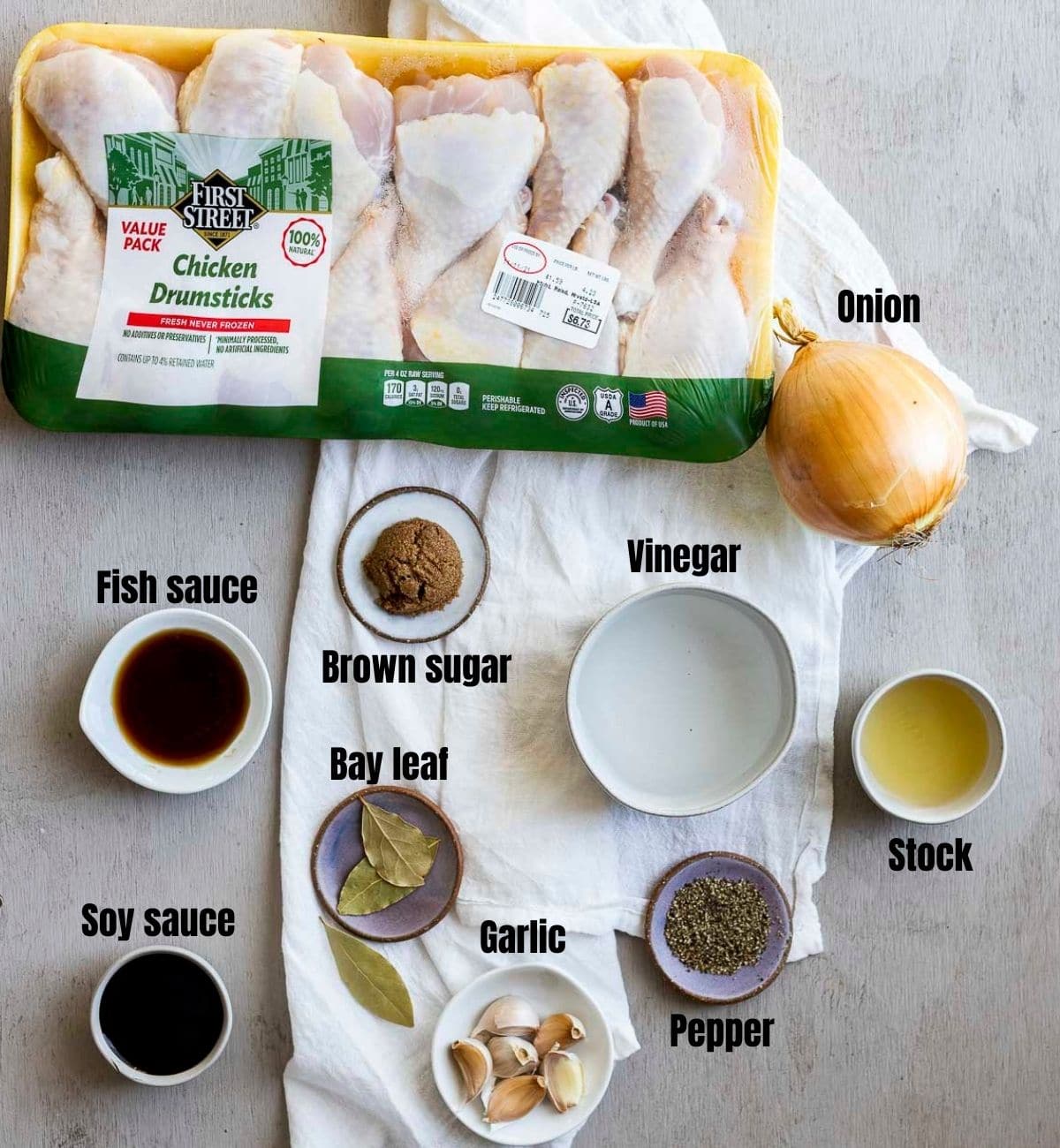 Ingredients to make Instant Pot chicken adobo arranged individually and labelled.