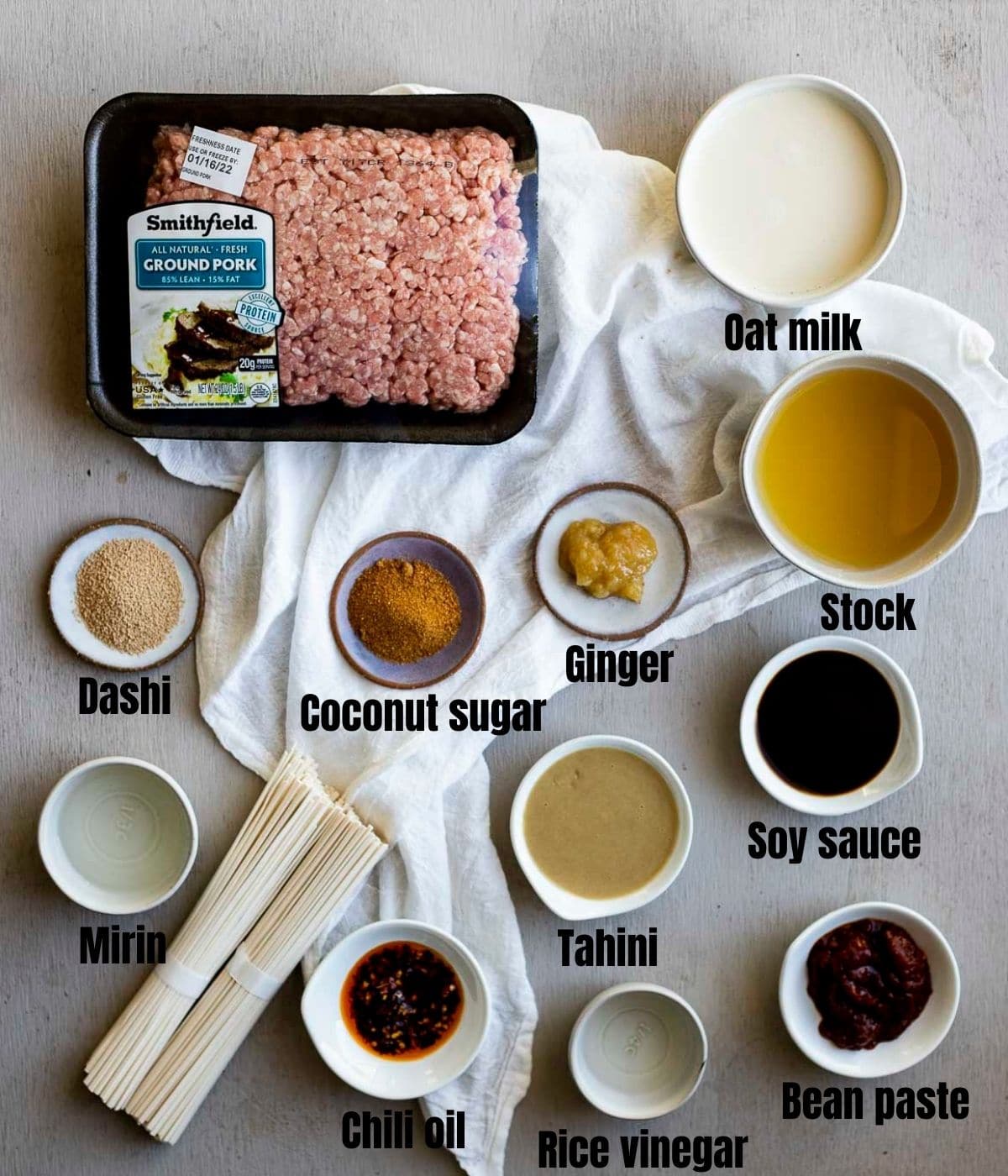 Ingredients to make tan tan ramen arranged individually and labelled.